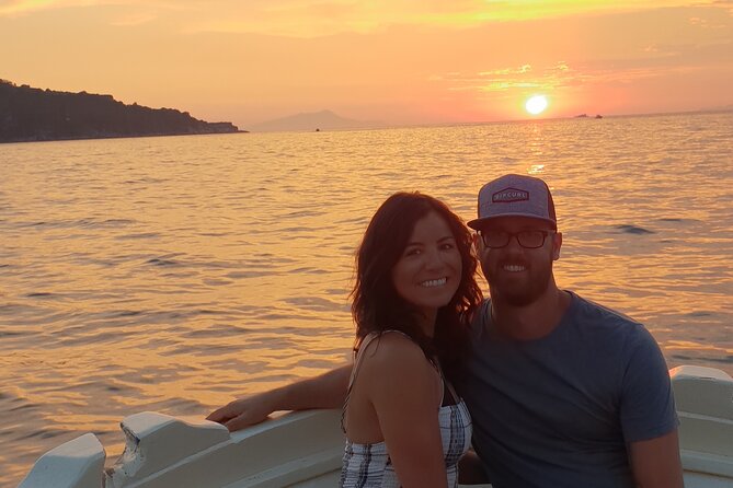 2-Hour Sorrento Coast Sunset Cruise with Dinner Experience - Punta Lagno, the waterfall, and the view toward Capri