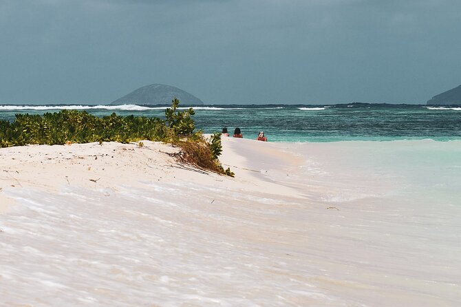 3 North Islands Catamaran Cruise with Lunch & Drinks on island. - Passing Coin de Mire, or Gunner’s Quoin