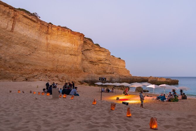Albufeira: 6-Hour Sunset Dinner Catamaran Cruise with Open Bar - Following the cliffs toward Benagil Cave