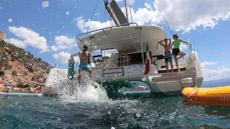 Alghero: Scenic Catamaran Cruise with Lunch and Snorkeling - Setting sail from Alghero’s port