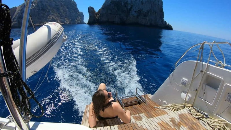 Alghero: Scenic Catamaran Cruise with Lunch and Snorkeling - Swim, snorkel, or stay on deck