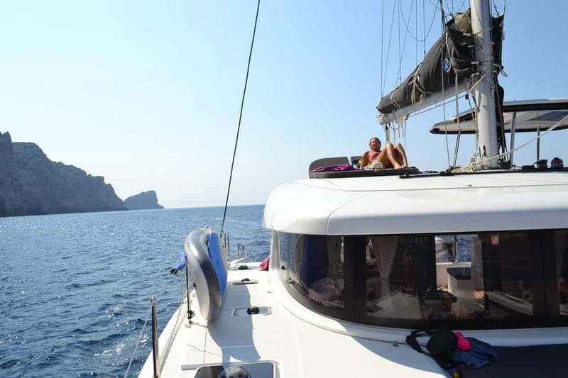 Alghero: Scenic Catamaran Cruise with Lunch and Snorkeling - Practical planning for the 7.5-hour outing