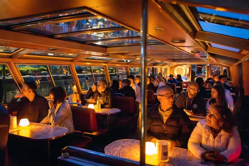 Amsterdam: Evening Cruise with Optional Wine and Snacks - Following the route through the old canal ring