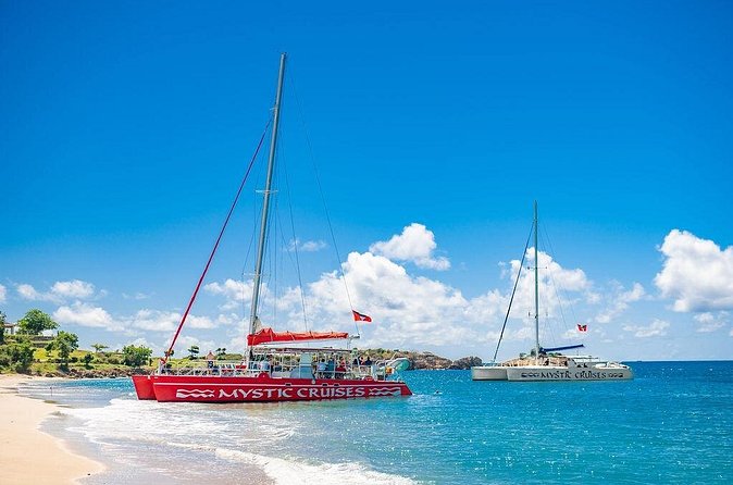 Antigua Seafood Lunch Cruise From St. John's - Sparkling wine, Caribbean music, and a friendly mood