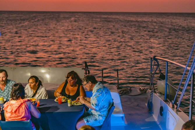 Aruba Sunset Sail Dinner Cruise with Open Bar by Catamaran - Sunset views and changing weather