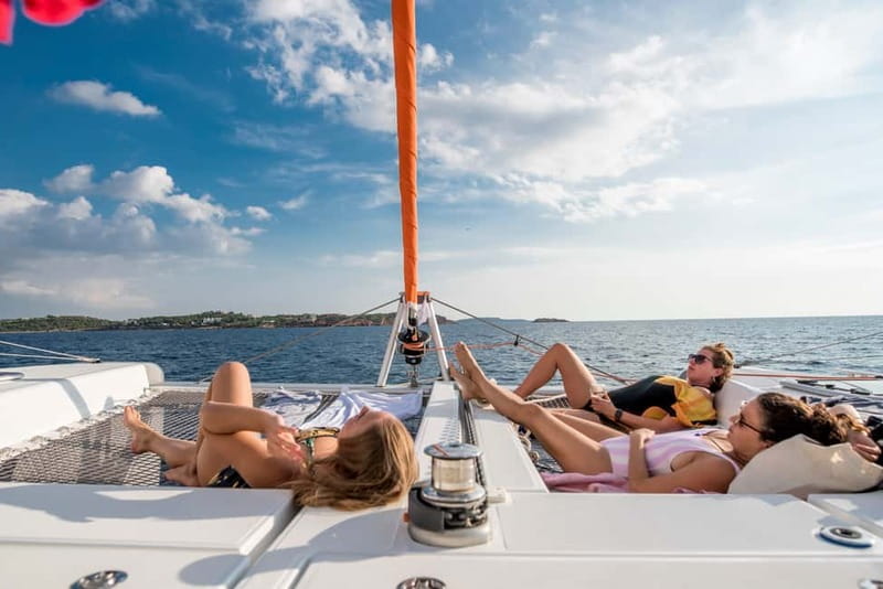 Athens: Half-Day Morning Catamaran Cruise with Meal & Drinks - Sailing south past Vouliagmeni Bay