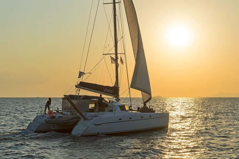 Athens: Half-Day Sunset Catamaran Cruise with Meal & Drinks - Swimming and snorkeling from the stern