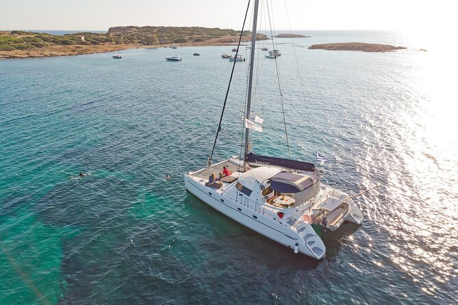 Athens Semi private Morning Catamaran cruise with meal & drinks - Vouliagmeni Beach and the Astir coastline