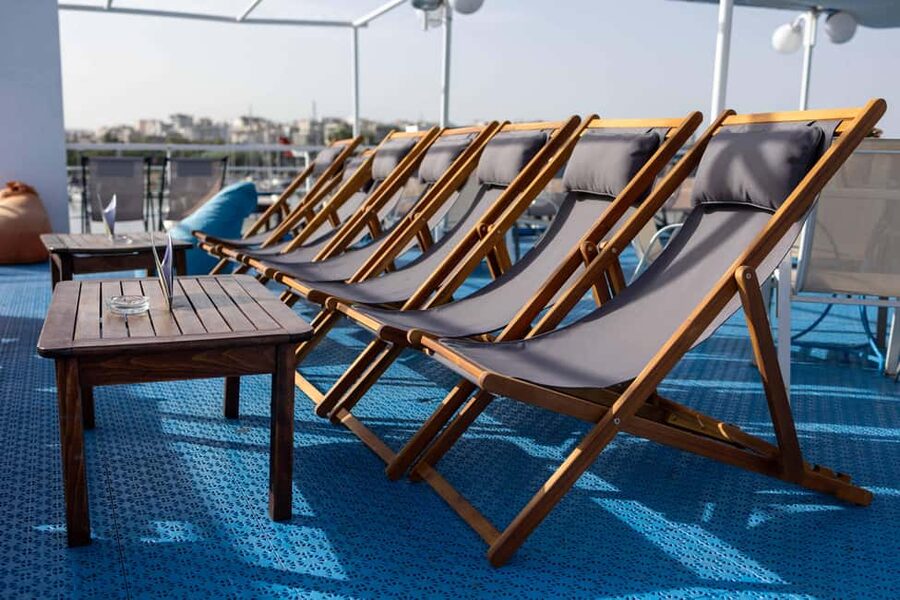Athens: Swimming Cruise with Lunch, Wine & Live DJ on Board - Metopi is the jump-off swimming stop