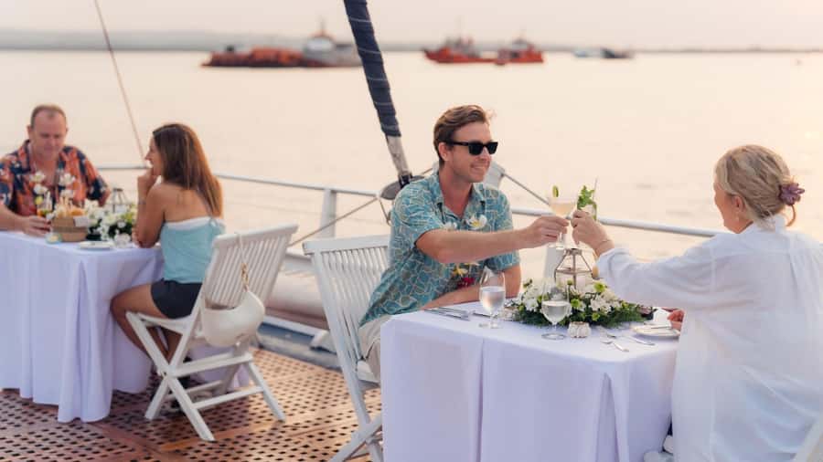 Bali/Benoa: 5-Course Romantic Evening Cruise With Live Music - Sailing across Benoa Bay toward Nusa Dua
