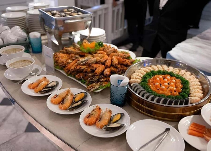 Bangkok: Carnival Dinner Cruise with Free-Flow Beer & Buffet - Dinner at the rear of the boat