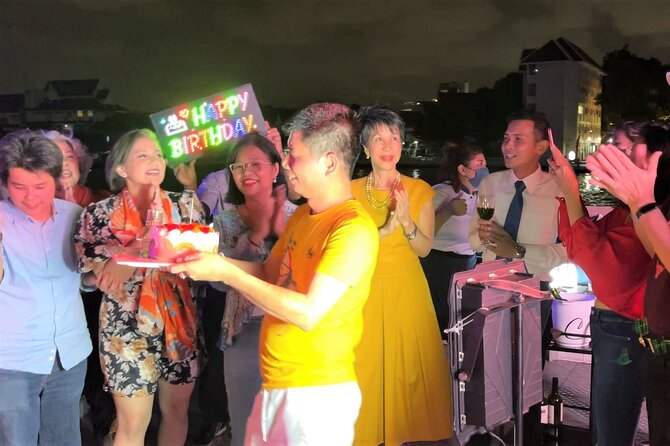 Bangkok Dinner Cruise with Intl Buffet, Live Music & Hotel Pickup - Boarding the boat and settling into dinner