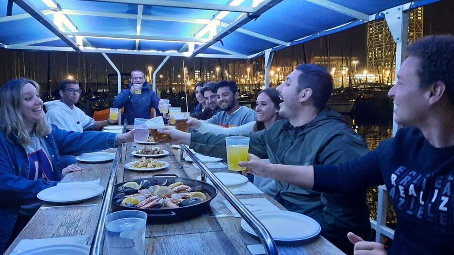 Barcelona: Private Evening Cruise with Dinner and Drinks - Leaving Olympic Port as Barcelona lights up