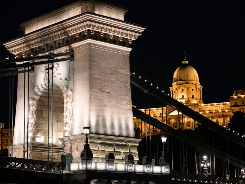 Budapest: BBQ Dinner Cruise w/ Live Music & Unlimited Drinks - Parliament, Liberty Bridge, and the illuminated Danube