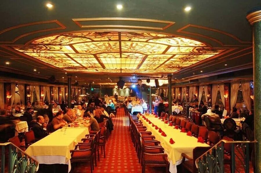 Cairo: Nile Dinner Cruise with Belly Dancer Show and Music - Boarding and settling in for dinner