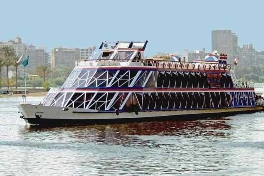 Cairo: Nile Dinner Cruise with Belly Dancer Show and Music - The open-air deck and Cairo after dark