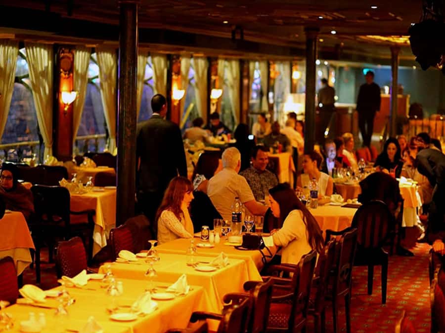 Cairo: Nile Dinner Cruise with Belly Dancer Show with Pickup - The Nile views are the real setting