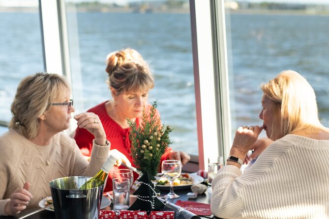 Christmas Lunch Cruise on Newcastle Harbour - Nobbys Head, lighthouse, and Stockton Breakwall