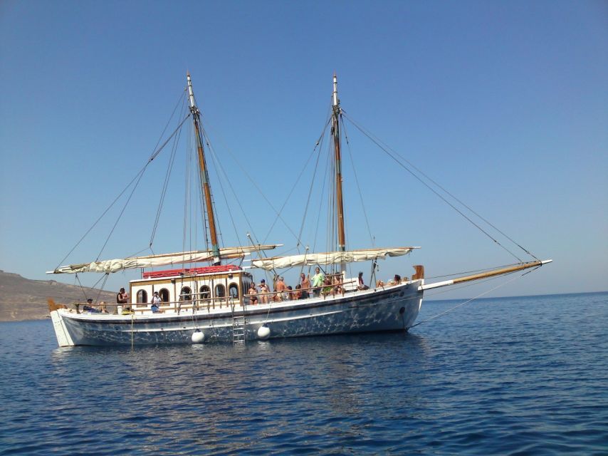 Corfu Town: Full-Day Cruise with Lunch, Drinks & Swim Stops - Leaving Corfu’s old port beside the Old Fortress