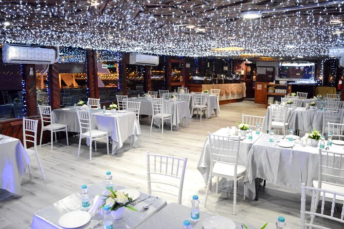 Dhow Cruise with Dinner at Dubai Marina - A dhow atmosphere with a modern Dubai setting