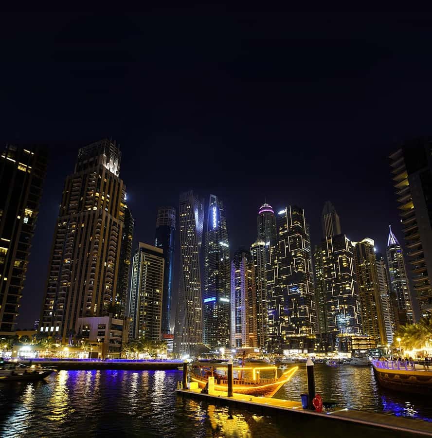 Dubai: Big Bus Panoramic Night Tour & Optional Dinner Cruise - Weather, seating, and sound tips