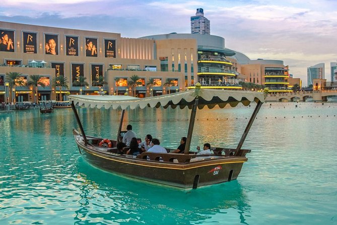 Dubai City Tour and Dhow Dinner Cruise Dinner - Jumeirah Mosque, white sand, and the Burj Al Arab