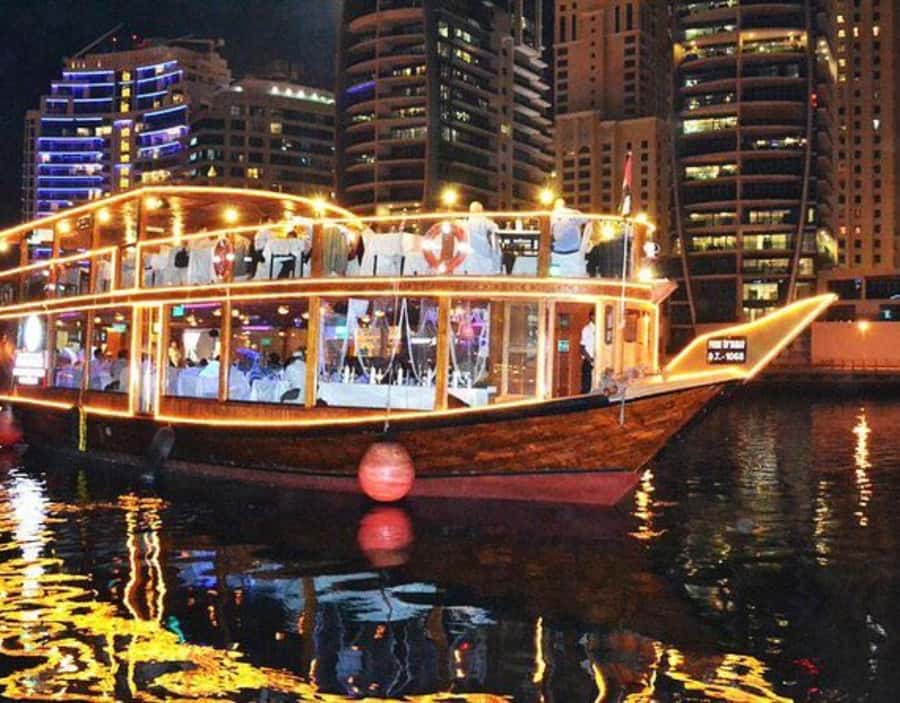 Dubai: Dhow Dinner Cruise on Creek or Marina with Live Shows - Sunset views before the city lights