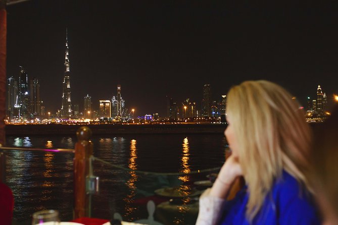 Dubai Luxury Canal Dinner Cruise with Optional Transfer - Dinner, drinks, and live entertainment