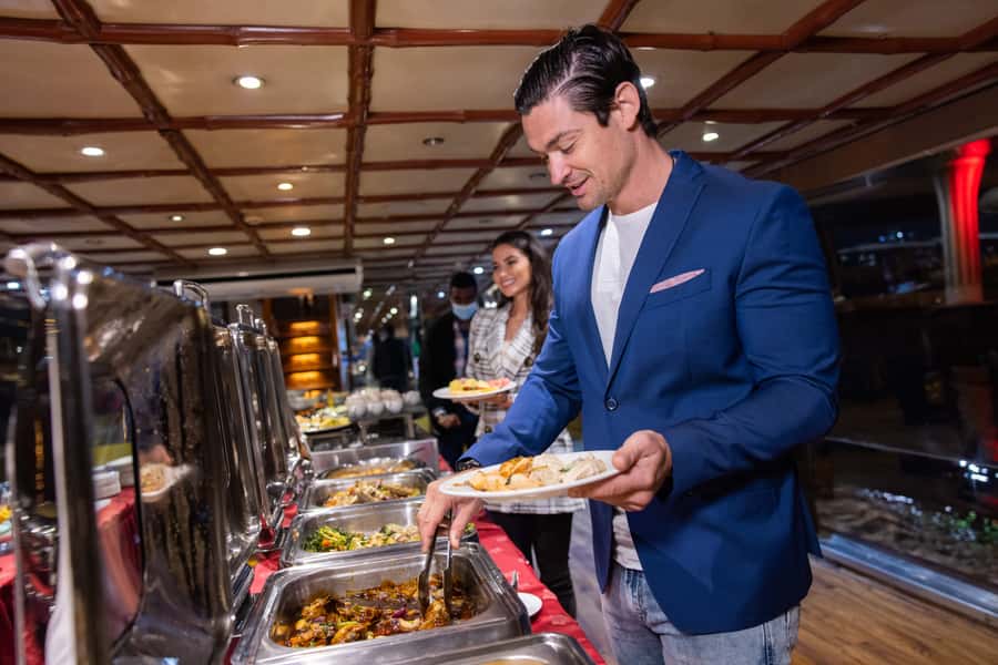 Dubai: Luxury Canal Dinner Cruise with Optional Transfers - Saxophone music and evening entertainment