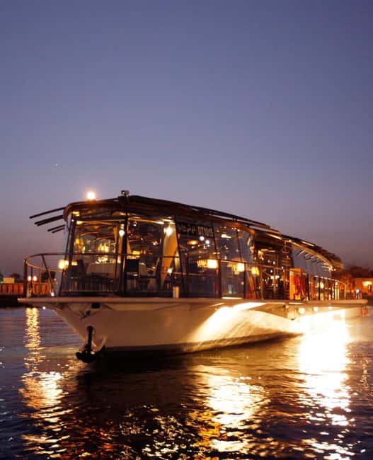 Dubai Marina Dinner Cruise – Live Show, AC & Open Bar - Sunset light, marina towers, and evening views
