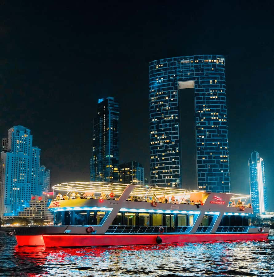 Dubai: Sunset or Dinner Cruise with Live Music & Open Bar - Sunset, skyline lights, and Ain Dubai