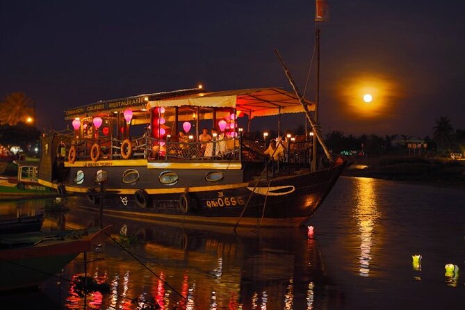 Experience Romantic Sunset Dinner Cruise in Hoi An - The outdoor observation deck and first drink