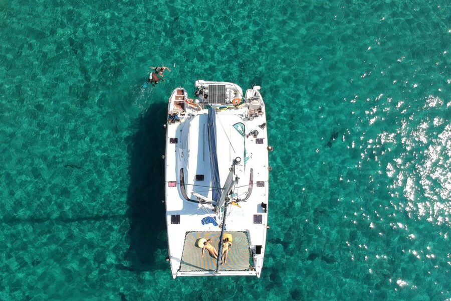 From Adamas: Milos and Poliegos Catamaran Cruise with Lunch - Gerakas, Tsigrado, and the south coast