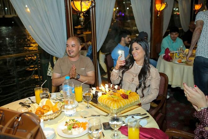 From Cairo: 5 Stars Nile Dinner Cruise with Live Entertainment - Boarding at the pier and getting settled