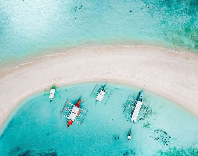 From Coron: Private Island-Hopping Cruise with Lunch - Lunch on the beach, not a restaurant stop