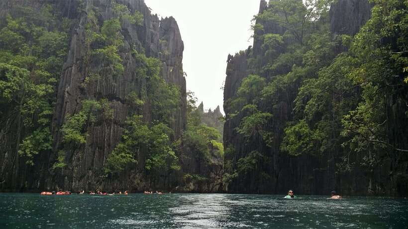 From Coron: Twin Lagoon and Skeleton Wreck Cruise with Lunch - Beach time at Corn Youth Club and Atwayan