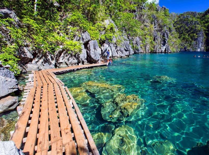 From Coron: Twin Lagoon and Skeleton Wreck Cruise with Lunch - Swimming in Twin Lagoon