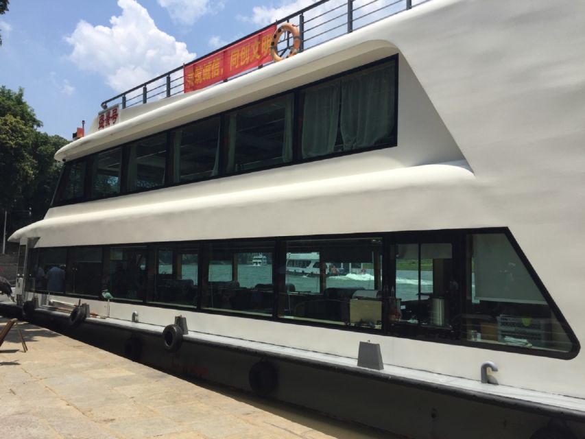 From Guilin: 4 Star Luxury Li River Cruise with Buffet Lunch - Four hours beneath the karst peaks