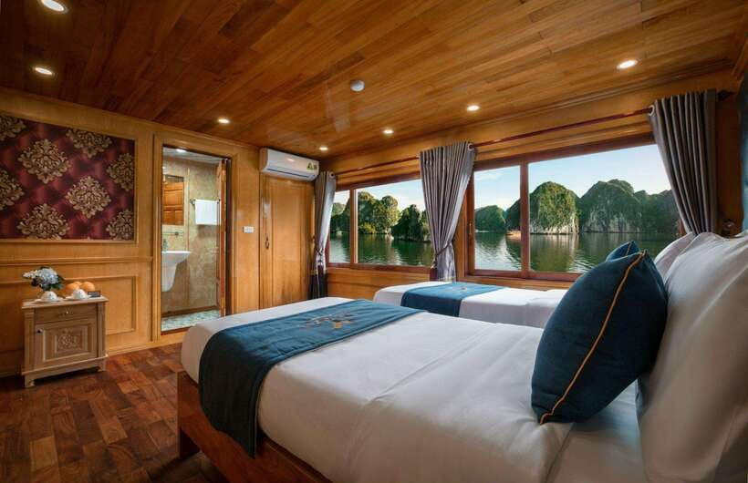 From Hanoi: Ha Long & Lan Ha Bay 2-Day Cruise with Meals - Sunset, spring rolls, and dinner onboard