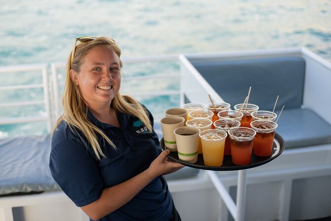 From Ma'alaea Harbor: Sunset Dinner Cruise Aboard the Quicksilver - Drinks and island-style music
