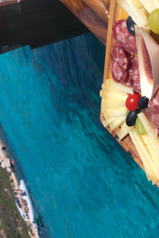 From San Paolo: Tavolara and Molara Island Cruise with Lunch - Food, drinks, and the pace of the day