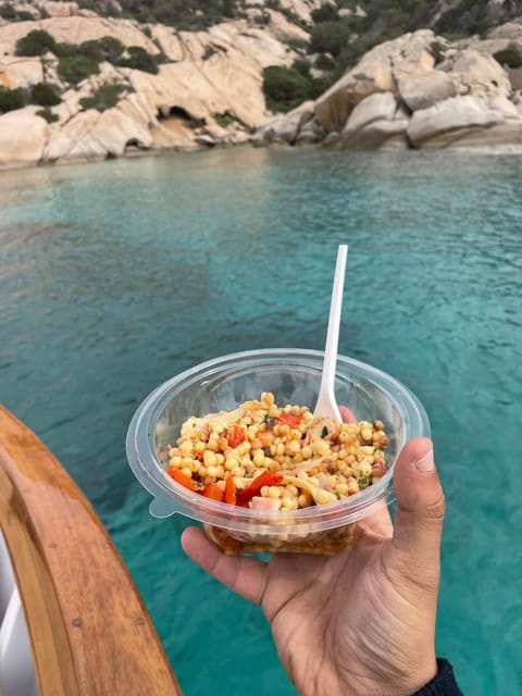 From San Paolo: Tavolara and Molara Island Cruise with Lunch - The first swim near Spiaggia del Dottore