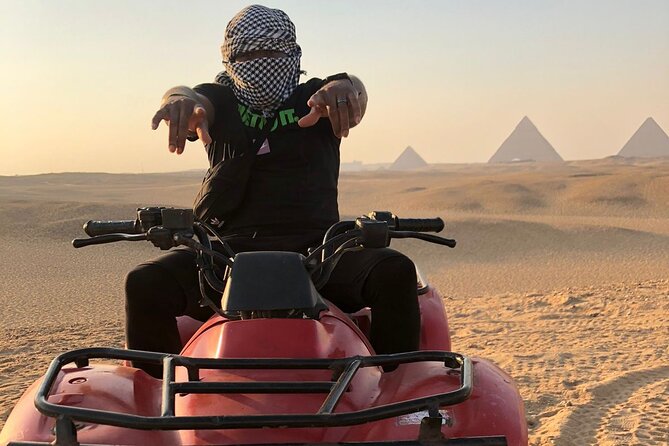 Giza pyramids, Sphinx, ATV bike, Lunch,Camel ride, Dinner cruise& shopping tour - One hour on an ATV near the Giza plateau