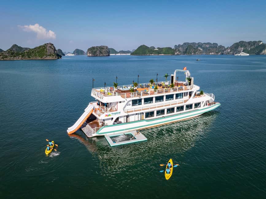 Ha Long Bay Luxury Day Cruise with Buffet Lunch - Boarding the boat and settling in for lunch