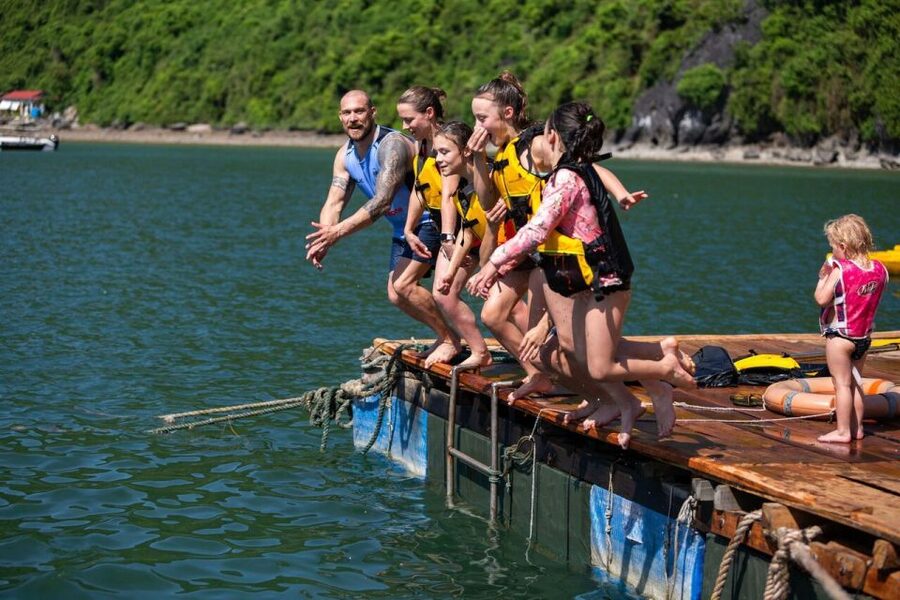 Ha Long & Lan Ha Bays: 2-Day Cruise with Meals & Kayaking - Bright Cave by traditional rowing boat