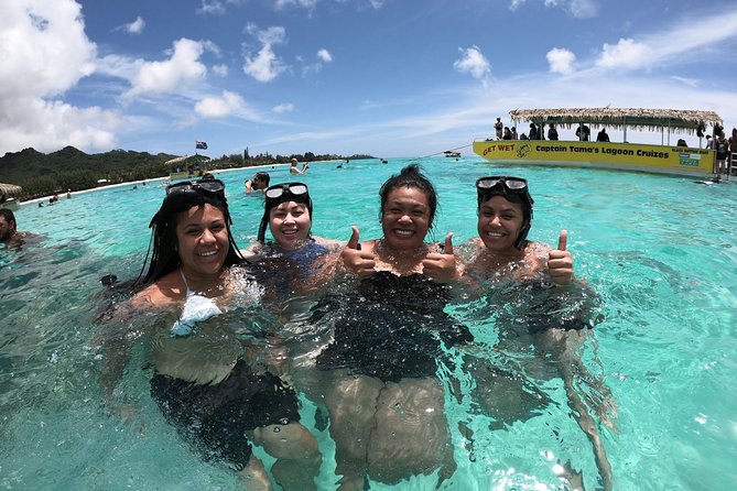 Half-Day Muri Lagoon BBQ Lunch Cruise including Snorkeling - Pareu tying, coconut work, and island music