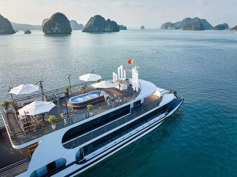 Halong Bay: Luxury Day Cruise with Buffet, Kayak, Swim - A long day from Hanoi to Tuan Chau Harbor
