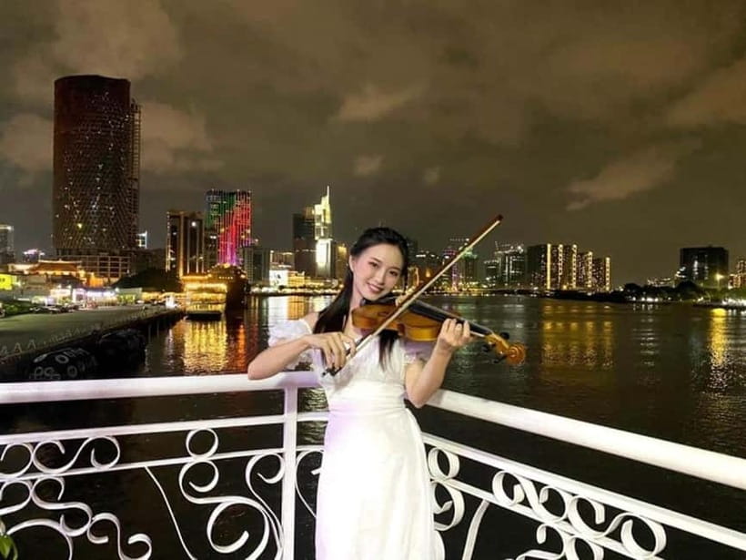 HCM: Night Experience Dinner Cruise on Saigon River - The optional scooter ride through central Ho Chi Minh City