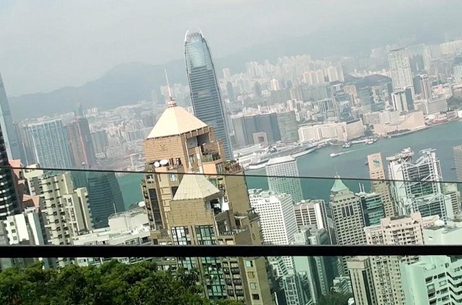 Hong Kong Afternoon Sightseeing Tour Plus Dinner Cruise with Hotel Pickup from Kowloon area - Crossing Victoria Harbour by Star Ferry