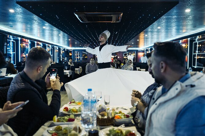 Istanbul Bosphorus Dinner Cruise: Turkish Night Show Experience - Ortaköy Mosque and the bridge lights